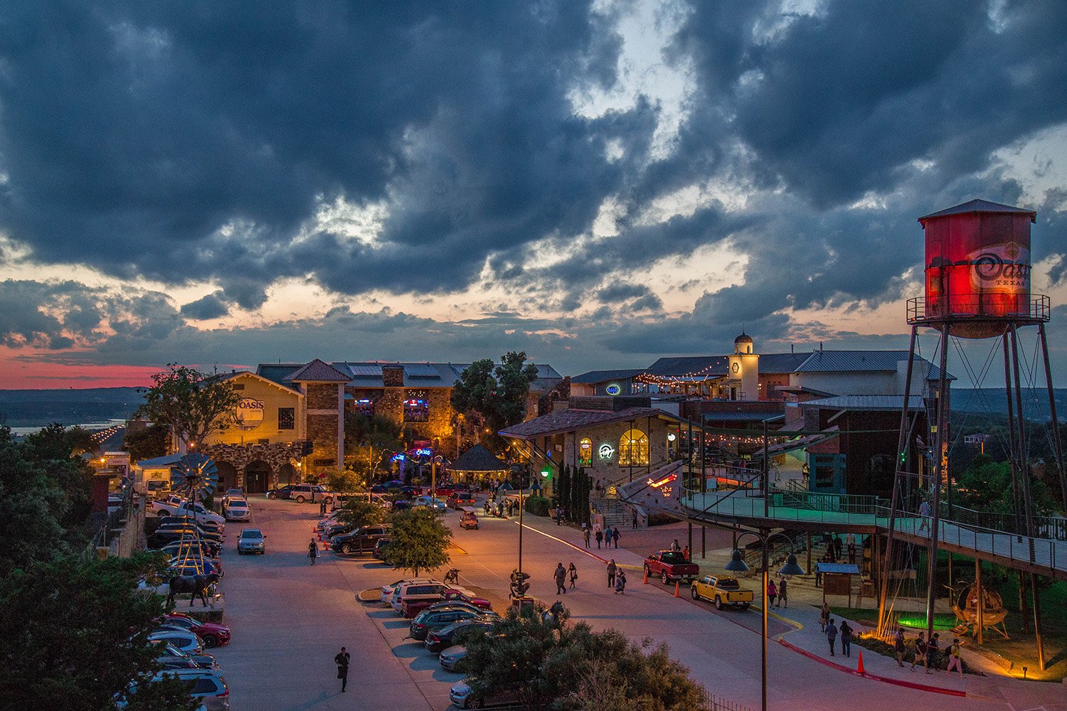 Restaurants and retail make up the bustling Oasis TX entertainment complex perched 450 above the waters of Lake Travis.