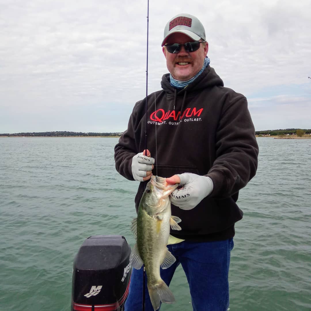 Kleigh's dad boats a nice black bass on Lake Travis on a chilly late October day.