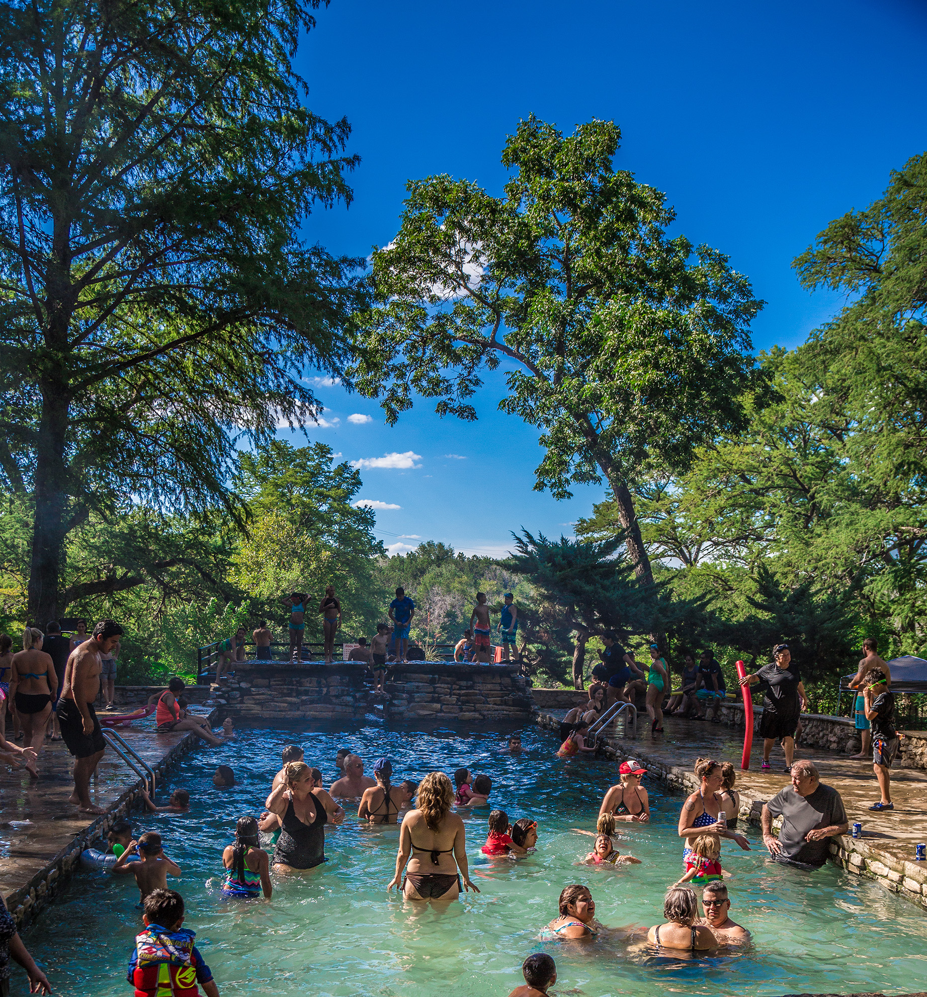 Wading in the upper springs at Krause Springs.  Photo: Will Taylor - LakeTravis.com